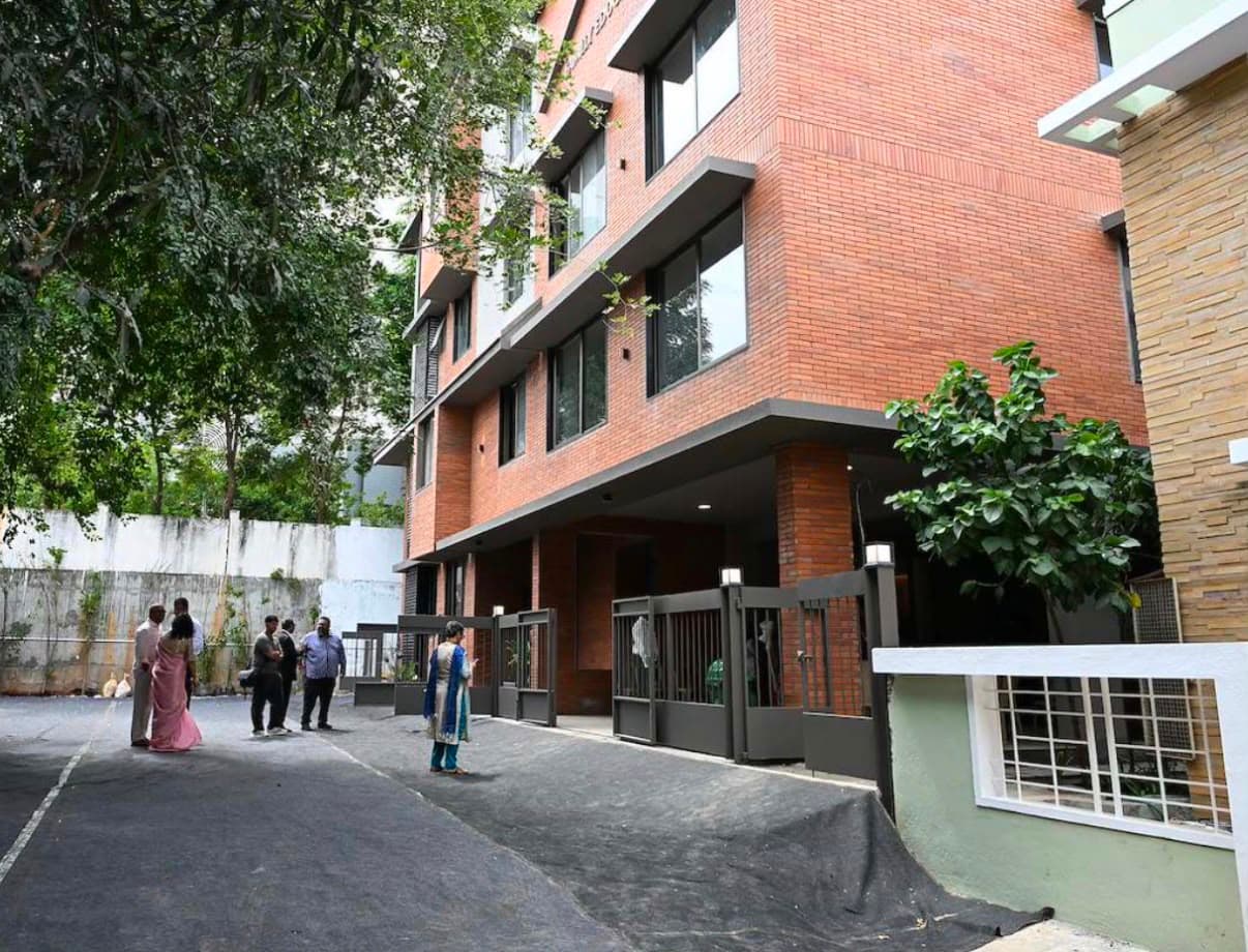 FEC entrance and campus grounds with visitors